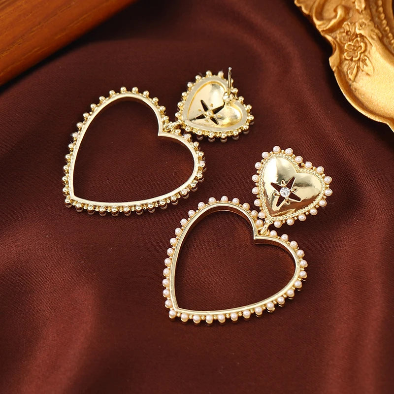 European and American popular new creative fashion exaggerated temperament hollowed out love earrings ear versatile temperament
