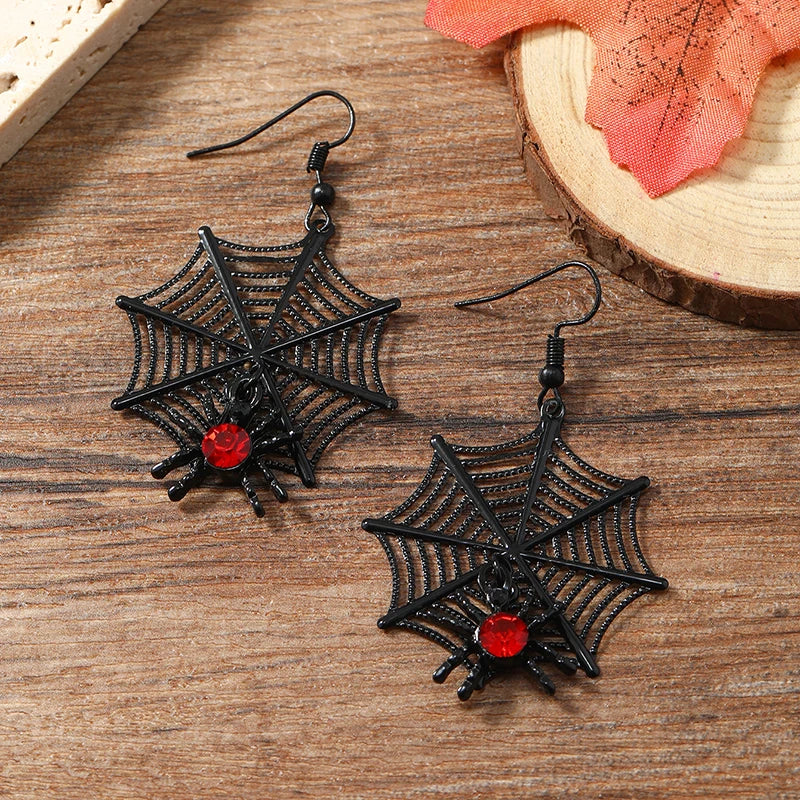 A pair of fashionable hanging earrings for women, with exaggerated creativity, spider skull inlaid with rhinestones, funny acryl