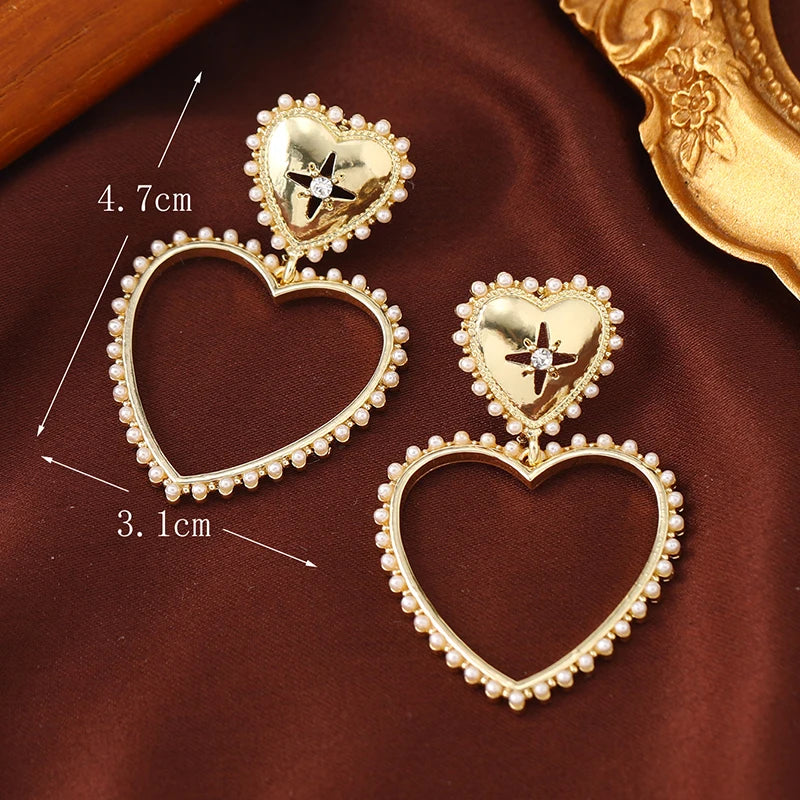 European and American popular new creative fashion exaggerated temperament hollowed out love earrings ear versatile temperament