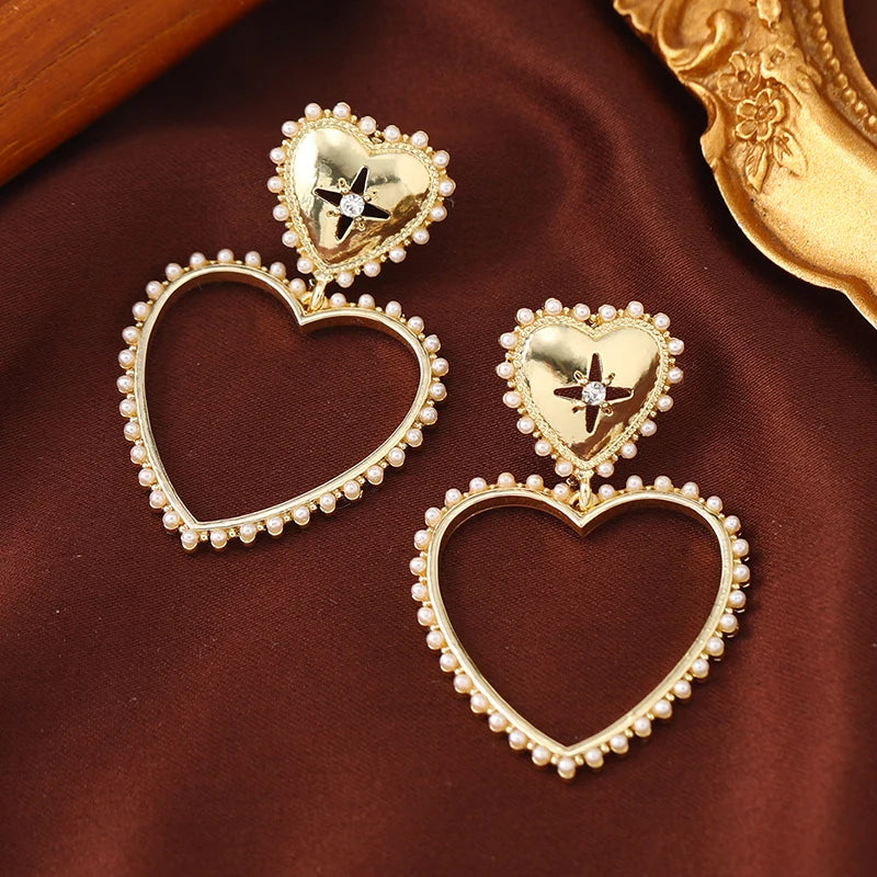 European and American popular new creative fashion exaggerated temperament hollowed out love earrings ear versatile temperament