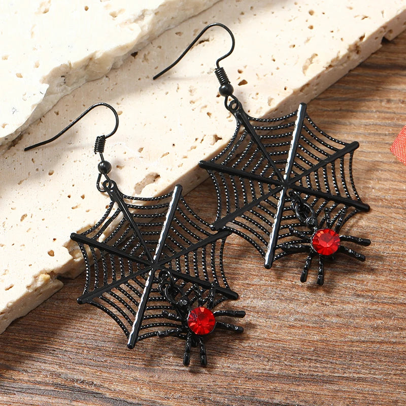 A pair of fashionable hanging earrings for women, with exaggerated creativity, spider skull inlaid with rhinestones, funny acryl