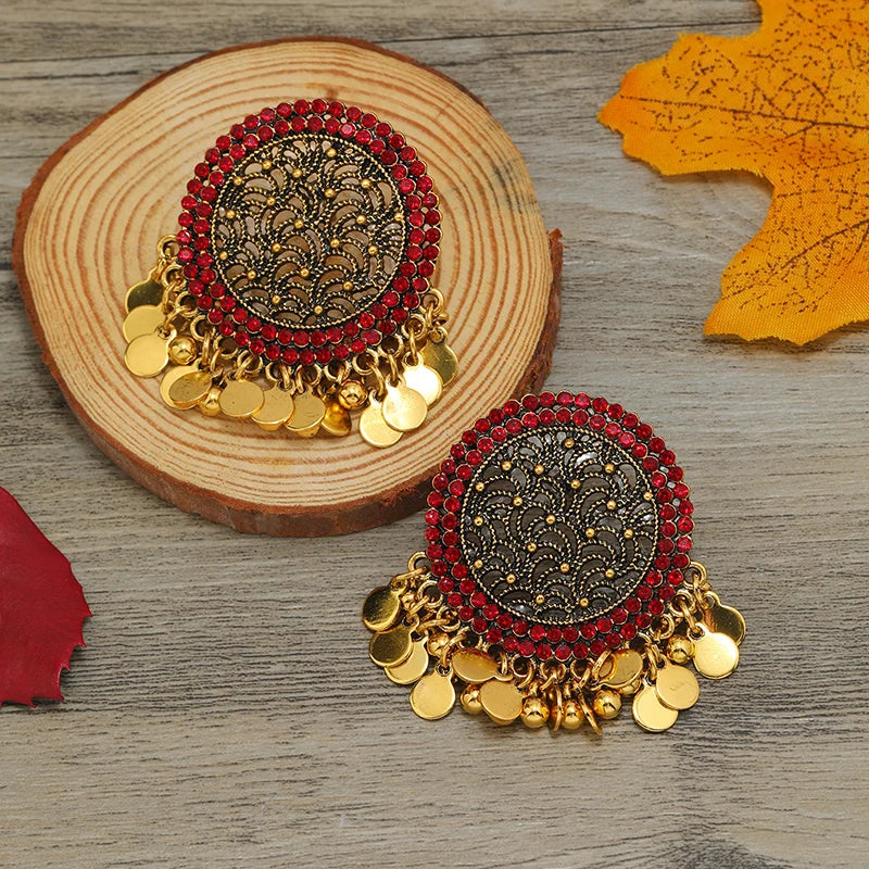 Exaggerated retro round earrings with Bohemian hollow pieces, tassels, and Indian style earrings