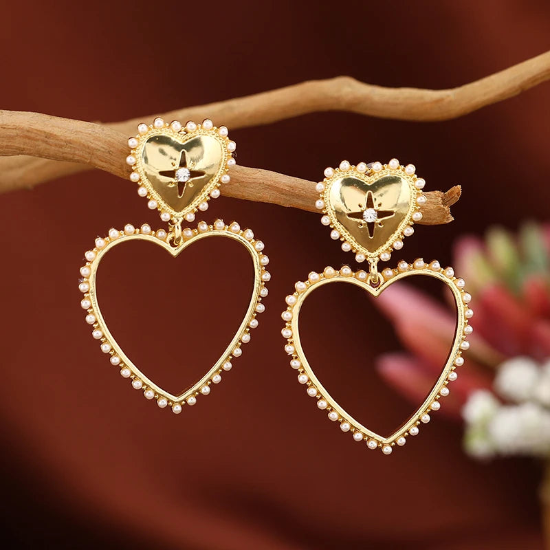 European and American popular new creative fashion exaggerated temperament hollowed out love earrings ear versatile temperament