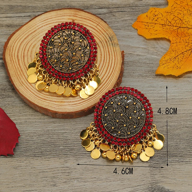 Exaggerated retro round earrings with Bohemian hollow pieces, tassels, and Indian style earrings