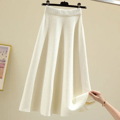 2023 autumn and winter new style western skirt mid-length solid color striped big swing knitted sweater skirt women