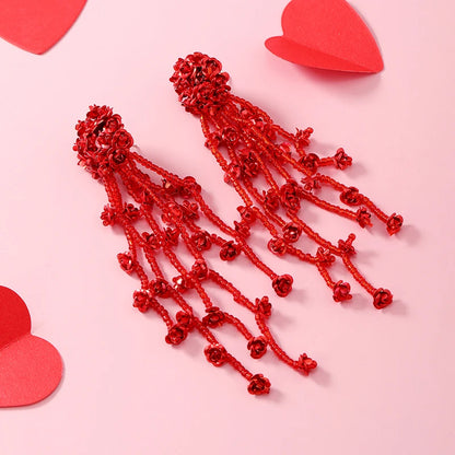 INS Japan and South Korea's popular floral tassels, silver needles, long rice bead earrings, earrings, accessories, commuting tr