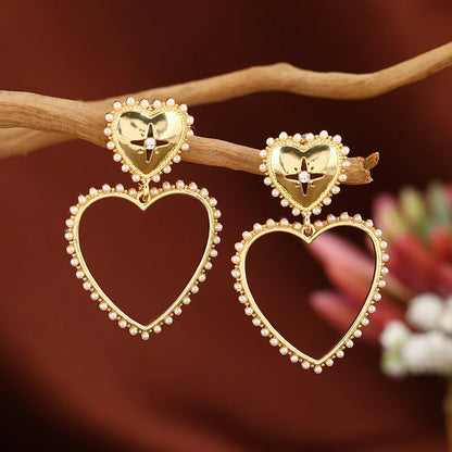 European and American popular new creative fashion exaggerated temperament hollowed out love earrings ear versatile temperament