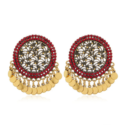 Exaggerated retro round earrings with Bohemian hollow pieces, tassels, and Indian style earrings